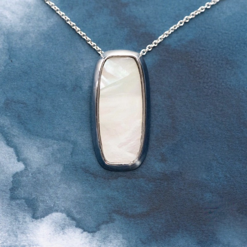 White table design Sterling Silver pendant with natural NZ Paua shell - Canterbury Jewellers Shop
